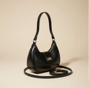 Elegant Black Handbag with Gold Detailing